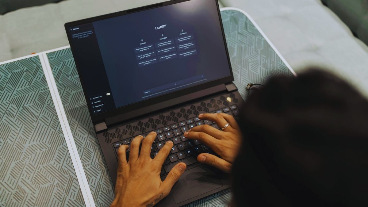 Person working with chatgpt on a laptop.